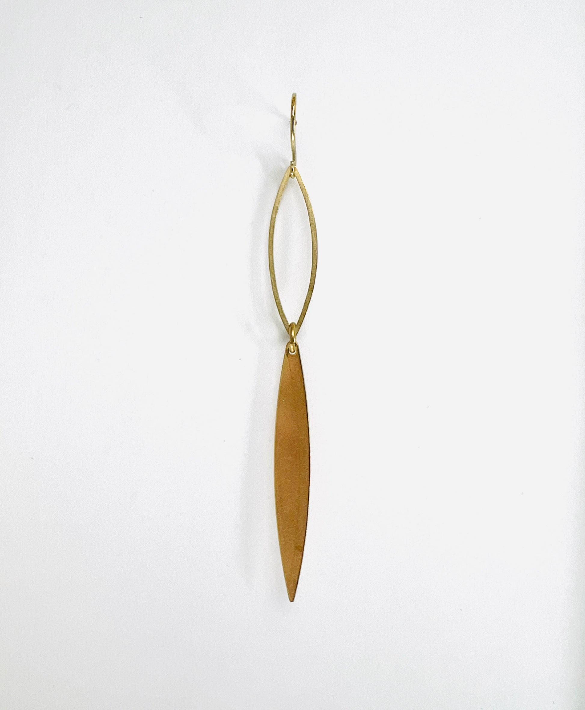 Minimal brass single earring, handcrafted intentional mix-and-match jewelry. Gold earring on a white background