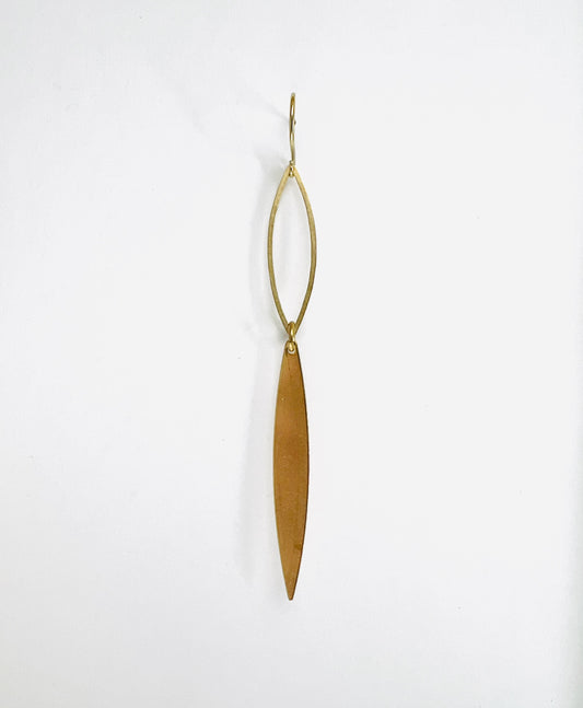 Minimal brass single earring, handcrafted intentional mix-and-match jewelry. Gold earring on a white background