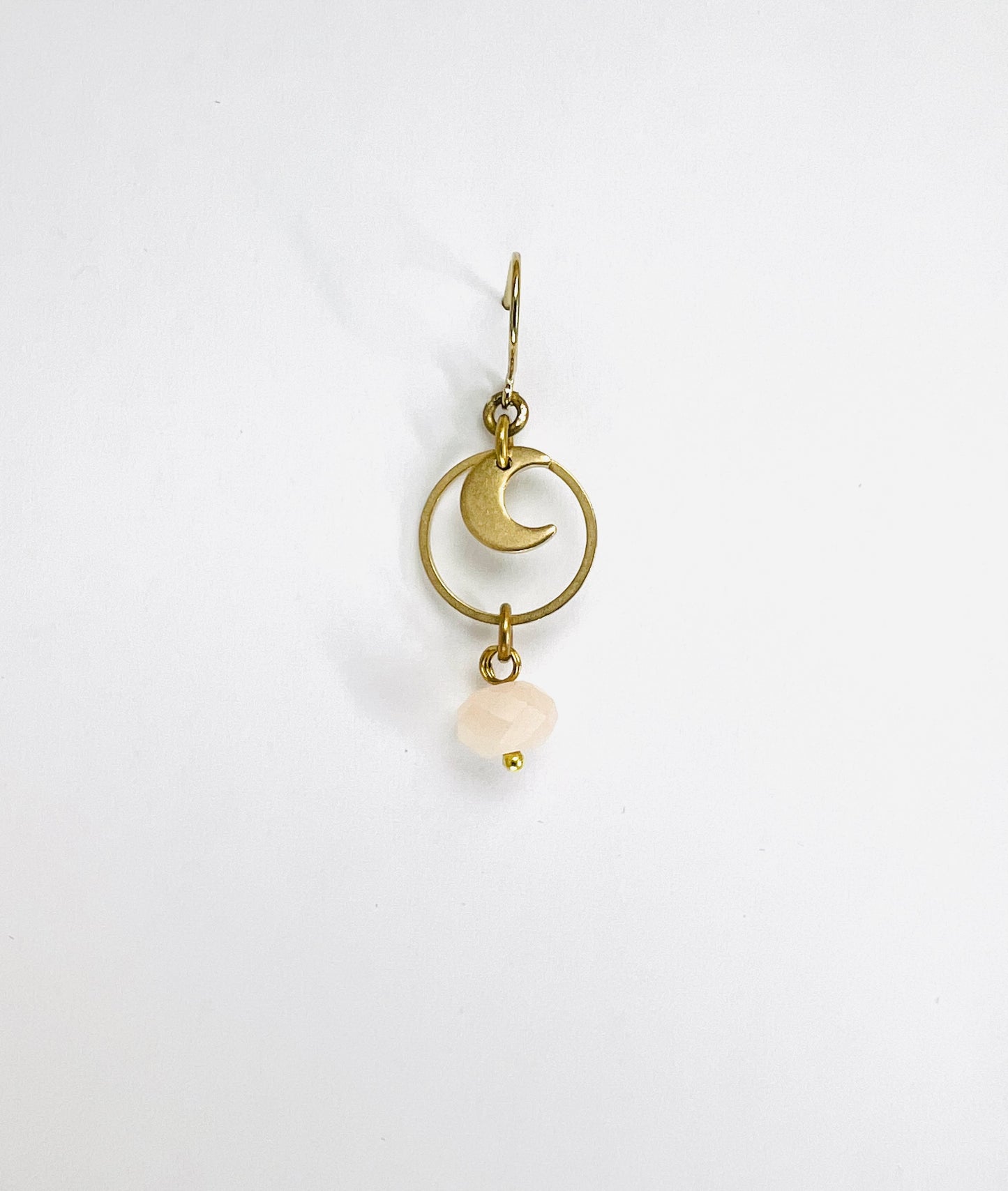 Pink Aventurine moon single crystal earring, handmade manifestation jewelry designed to support positivity, emotional balance, and gentle prosperity. Gold earring with a moon design and pearl-like bead on a white background