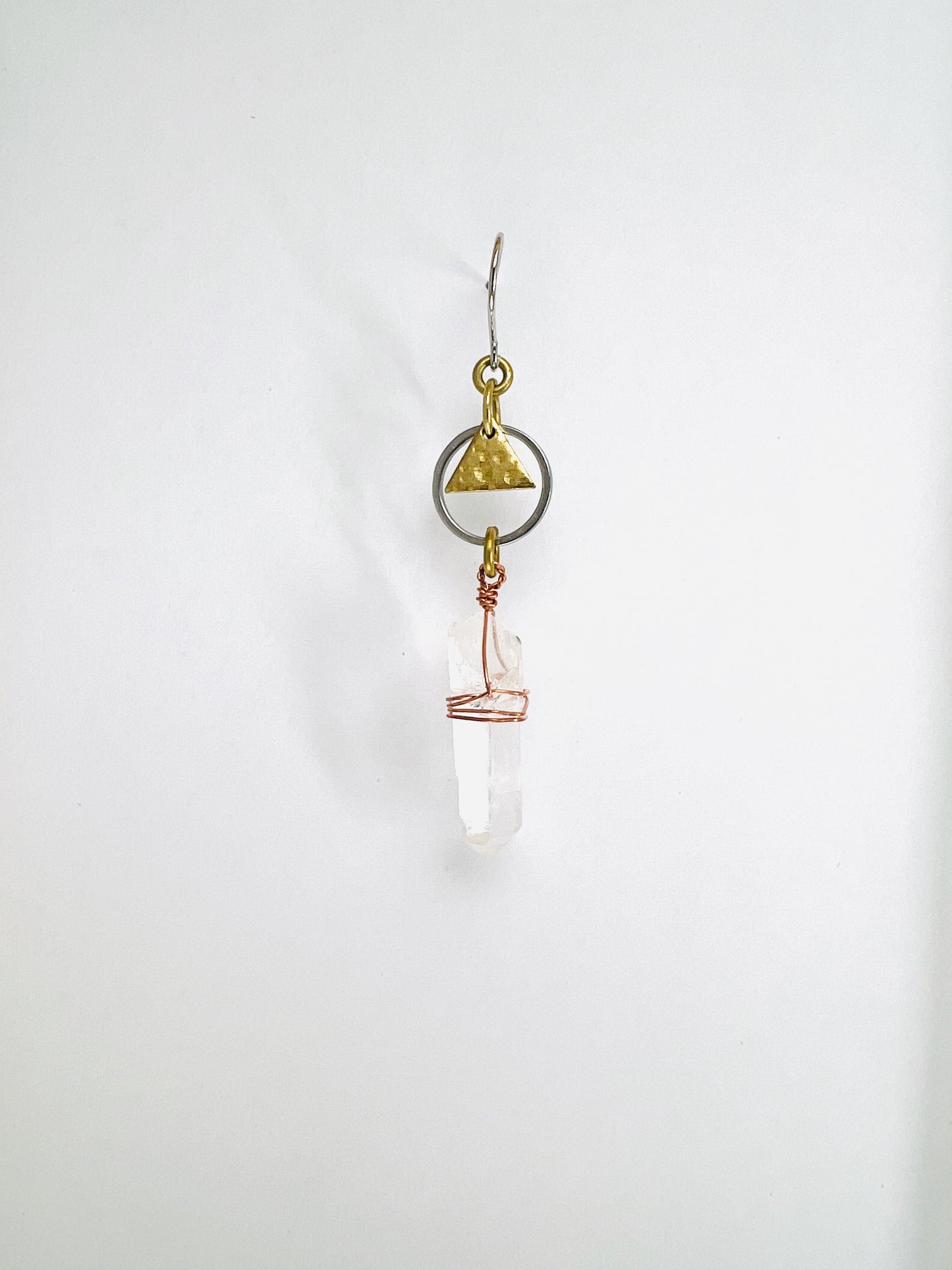 Raw Clear Quartz single crystal earring, handmade manifestation jewelry designed to support clarity, focus, and energetic balance.