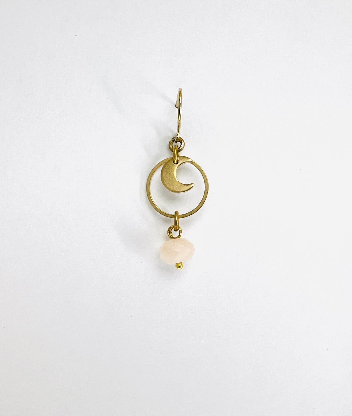 single Pink Aventurine and crescent moon crystal earring; handmade manifestation jewelry designed to support positivity, emotional balance, and gentle prosperity on a white background.