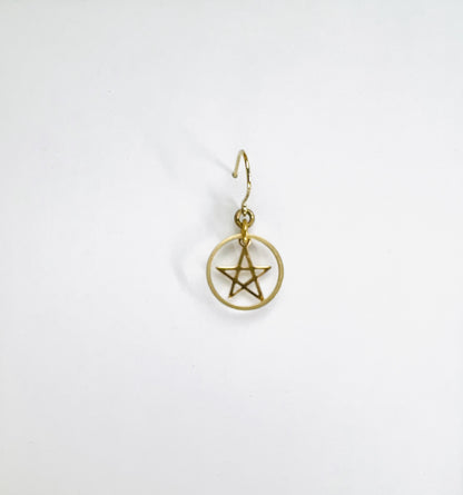 Minimalist single brass earring with star; handcrafted intentional jewelry designed for everyday wear on a white background