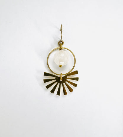 A single gold, metal dangle earring with a white rose quartz crystal and gold fan and ring, presented on a white background.